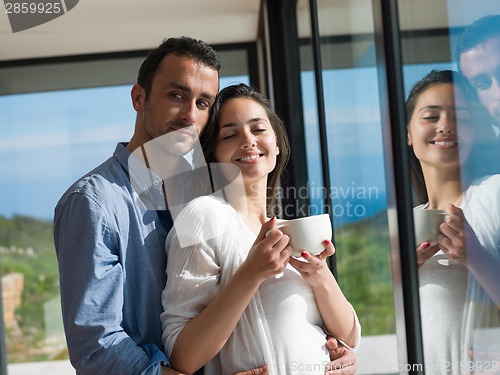 Image of relaxed young couple at home