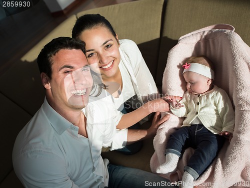 Image of happy young family at home