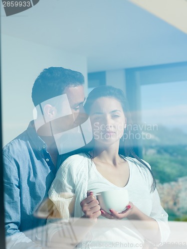 Image of relaxed young couple at home