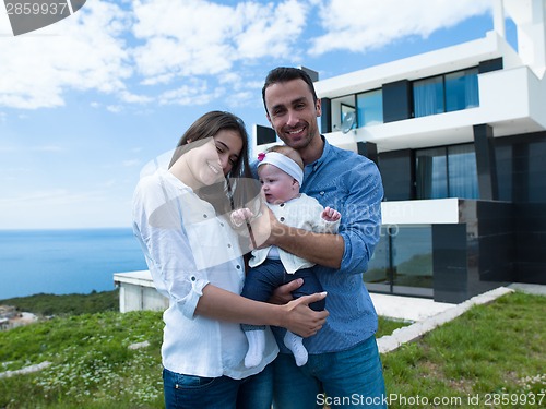 Image of happy young family at home