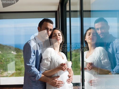 Image of relaxed young couple at home