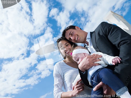 Image of happy young family at home
