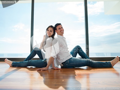 Image of relaxed young couple at home