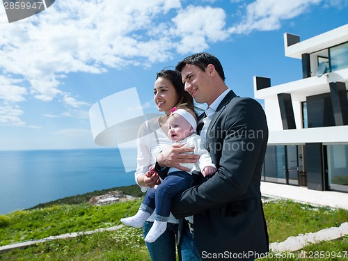 Image of happy young family at home