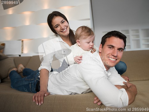 Image of happy young family at home