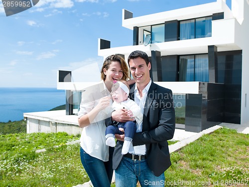 Image of happy young family at home