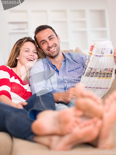 Image of relaxed young couple at home