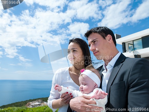 Image of happy young family at home