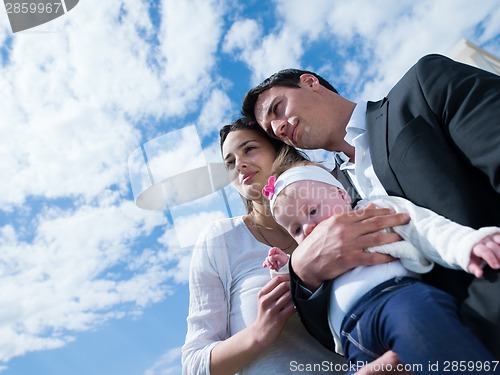 Image of happy young family at home