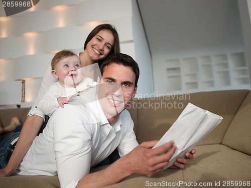 Image of happy young family at home