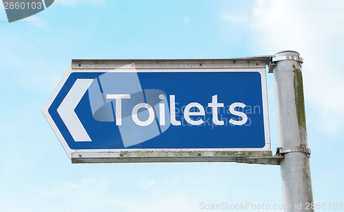 Image of Signpost points to public toilets