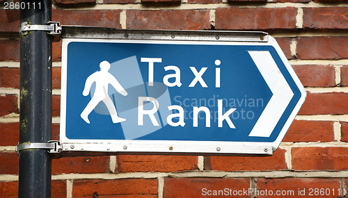 Image of Signpost points to a taxi rank