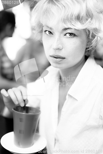 Image of Lady With Cup of Coffee.