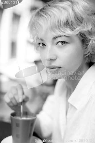 Image of Lady With Cup of Coffee.