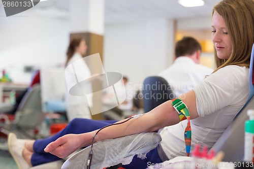 Image of Nurse and blood donor at donation.