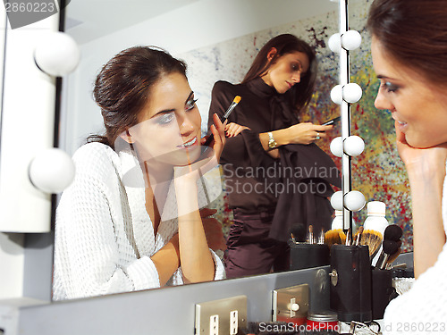 Image of woman in dressing room dlm