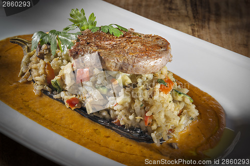 Image of beef with risotto
