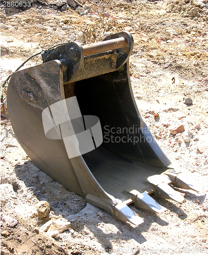 Image of Cutout with a digger shovel on a site