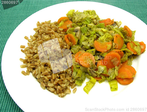 Image of Dish made of cooked bulgur wheat groats, carrots and leek