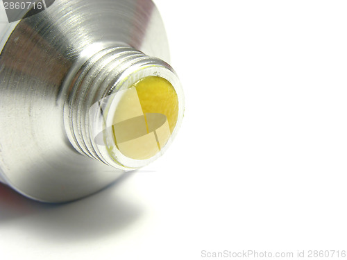 Image of One open tube of horseradish on white