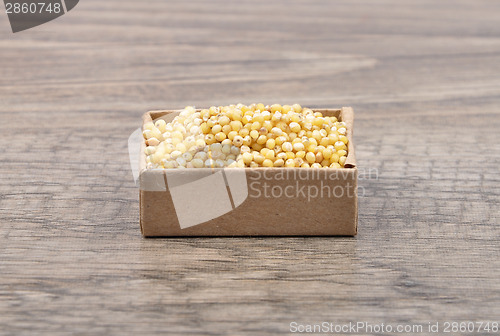 Image of Sorghum on wood