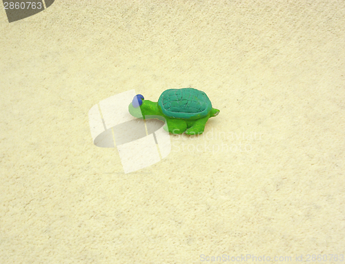 Image of Hand made ceramic turtle on soft background