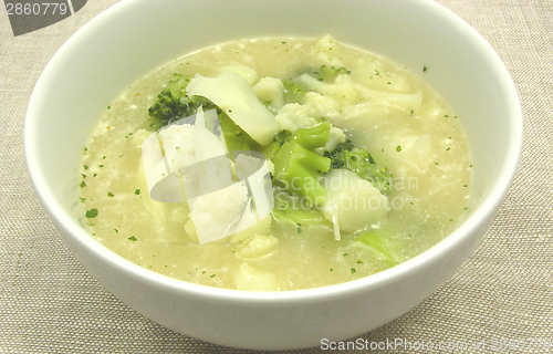 Image of Soup with cauliflower and broccoli in a bowl of chinaware