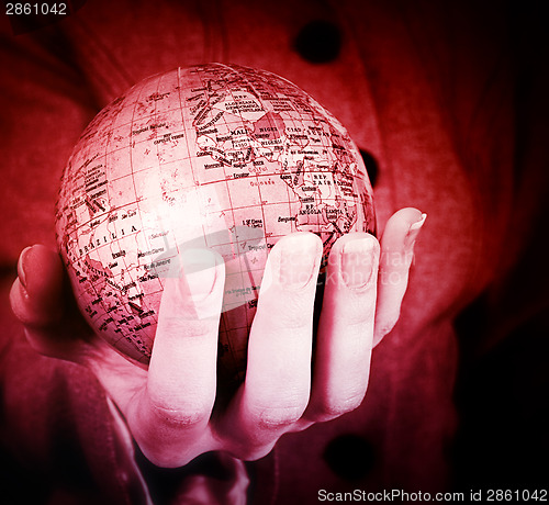 Image of Globe in a girl's hands