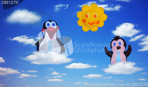 Image of Penguins and sun