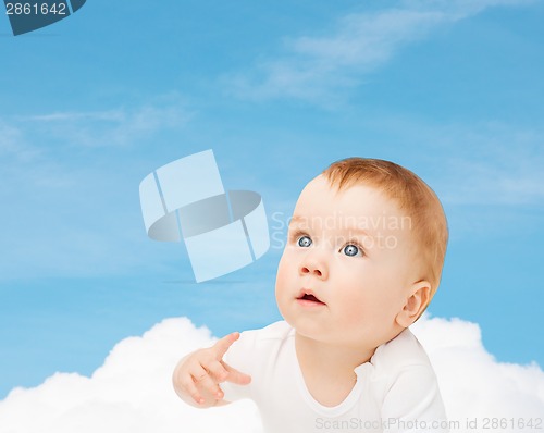 Image of curious baby looking up