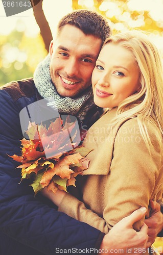 Image of romantic couple in the autumn park