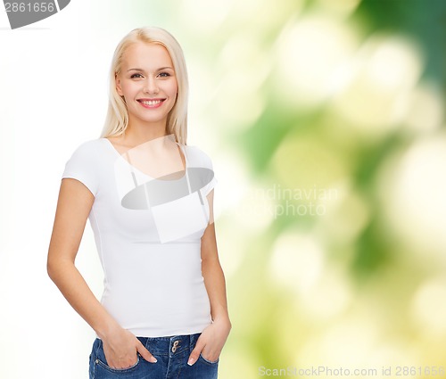 Image of smiling woman in blank white t-shirt