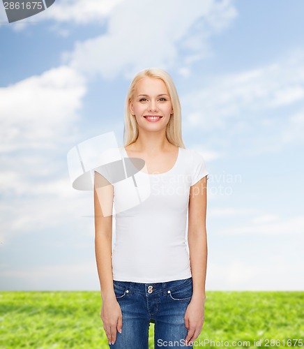 Image of smiling woman in blank white t-shirt