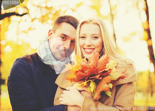 Image of romantic couple in the autumn park
