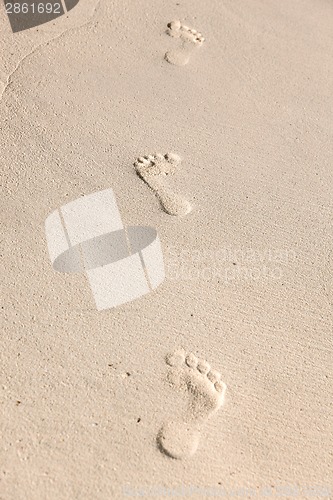 Image of footprints on sand