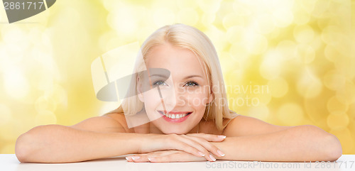 Image of clean face and shoulders of beautiful young woman