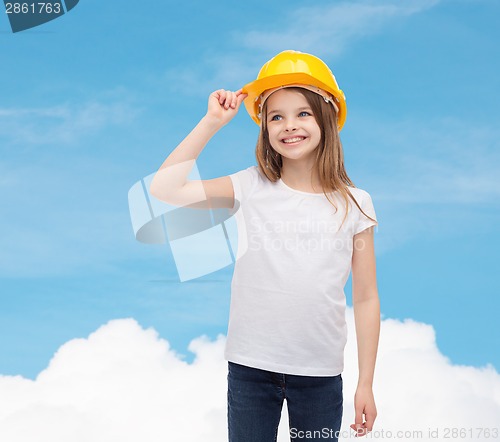 Image of smiling little girl in protective helmet