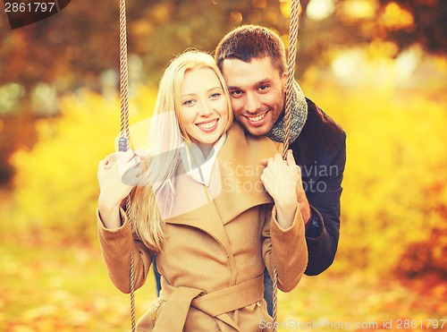 Image of romantic couple in the autumn park