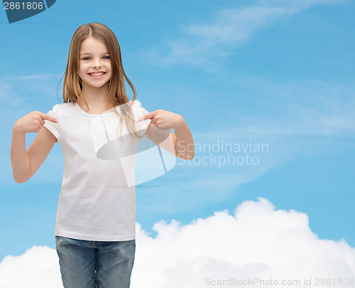 Image of smiling little girl in blank white t-shirt