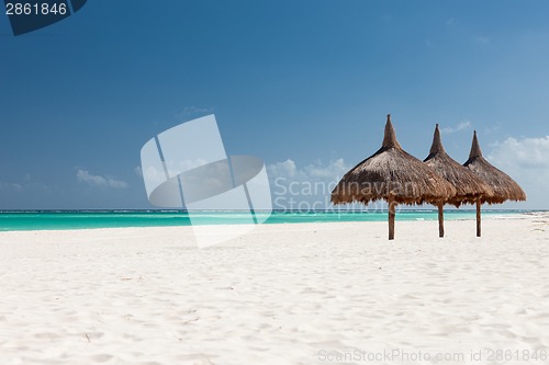 Image of tropical beach with palapa