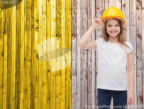 Image of smiling little girl in protective helmet