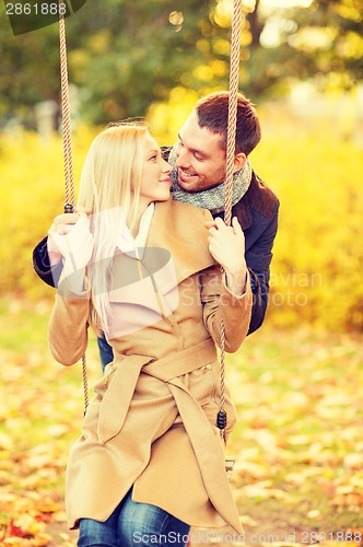 Image of romantic couple in the autumn park