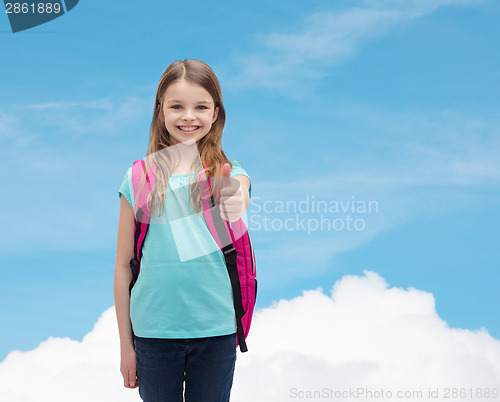 Image of smiling girl with school bag showing thumbs up