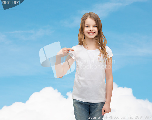 Image of smiling little girl in blank white t-shirt