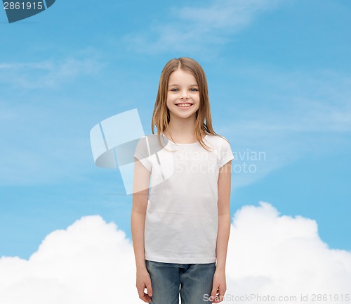 Image of smiling little girl in white blank t-shirt