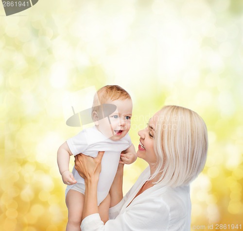 Image of happy mother with smiling baby