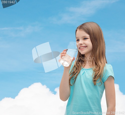 Image of smiling little girl with glass of water