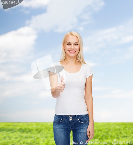 Image of woman showing thumbs up