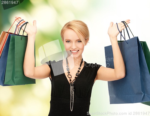 Image of lovely woman with shopping bags