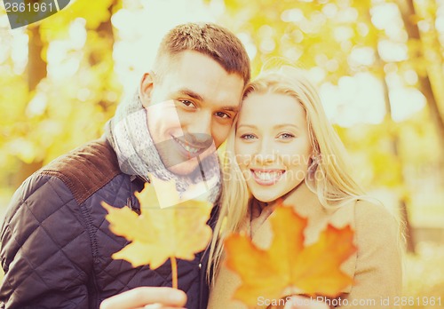 Image of romantic couple in the autumn park